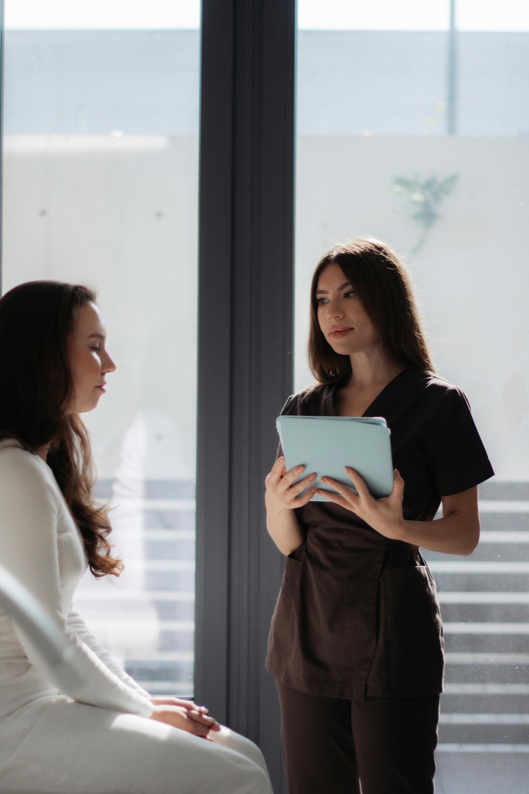 Nurse consulting a patient